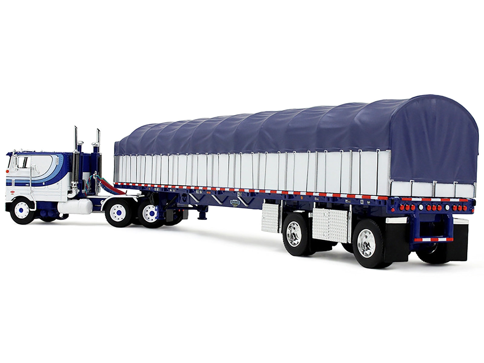 Peterbilt 352 COE 110" Sleeper and 53' Wilson Roadbrute Flatbed Trailer with Covered Wagon White with Blue Stripes 1/64 Diecast Model by DCP/First Gear
