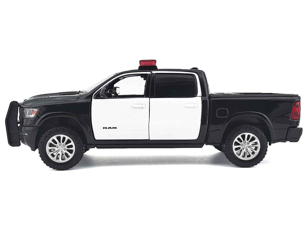 2019 RAM 1500 Laramie Crew Cab Pickup Truck Black and White with Flashing Light Bar and Front and Rear Lights and Sounds 1/27 Diecast Model Car by Motormax
