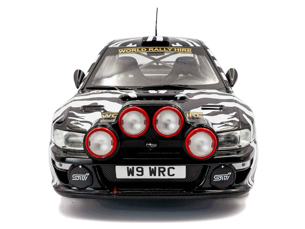 Subaru Impreza S5 WRC99 #38 Nigel Heath - Steve Lancaster "Rallye de Portugal" (2001) "Competition" Series 1/18 Diecast Model Car by Solido